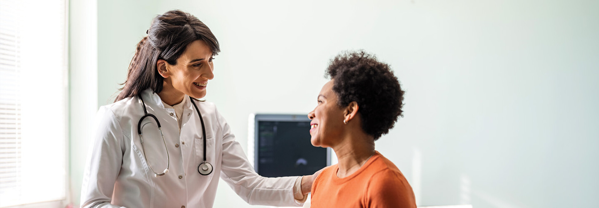 doctor reassures patient