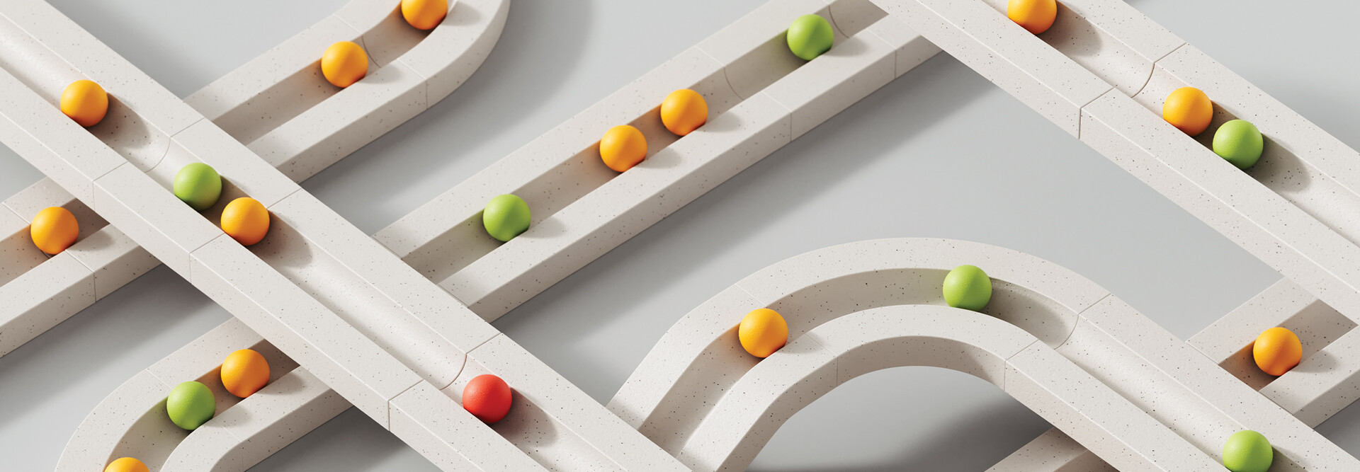 colorful marbles move through white paths