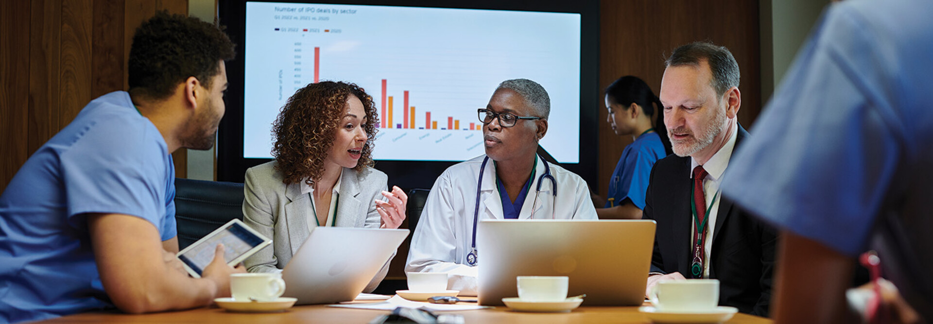clinicians and IT team meeting