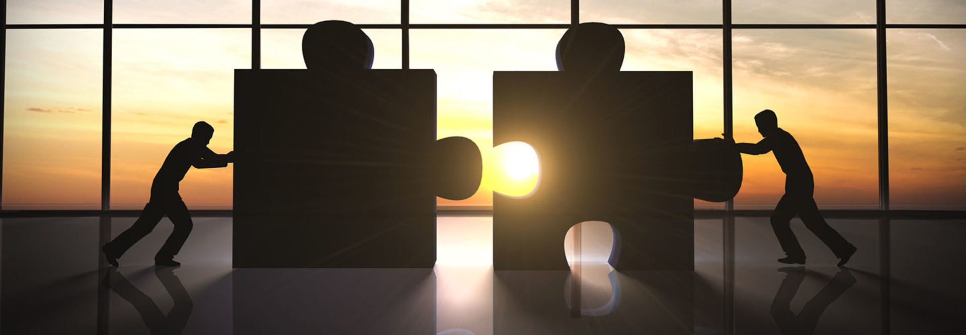 puzzle pieces being pushed together