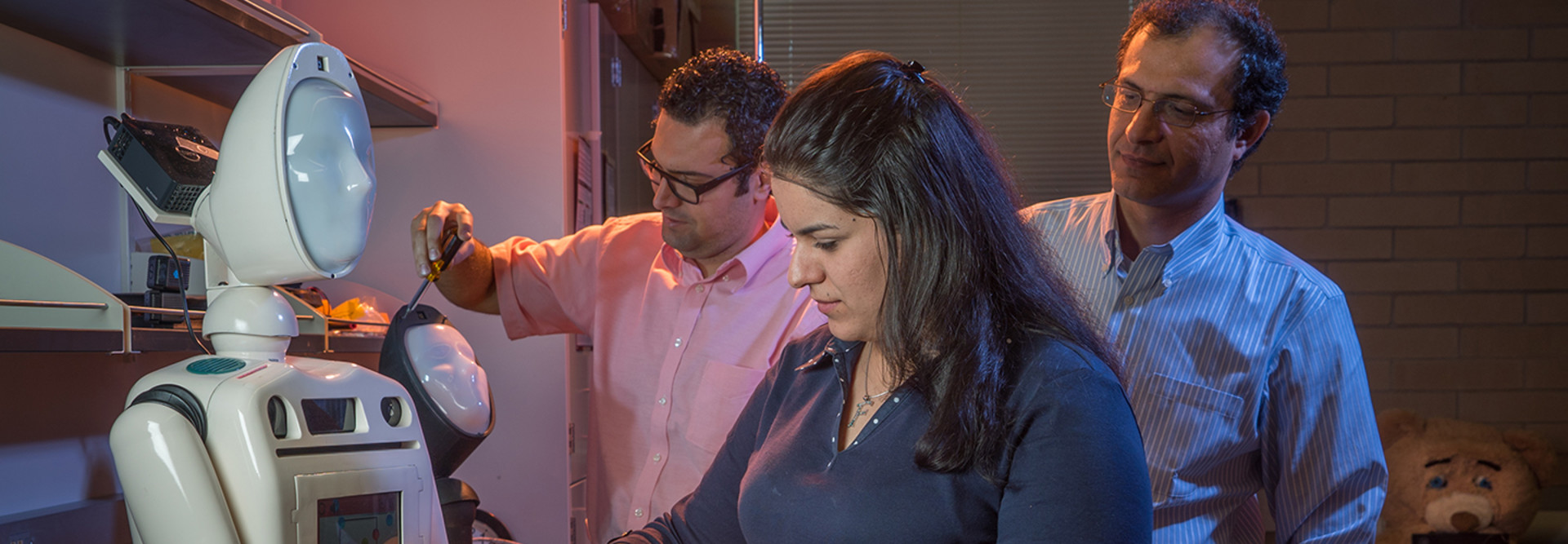 Researchers inspect robot