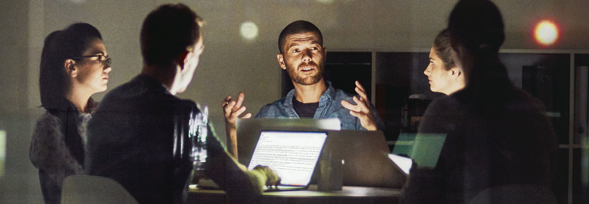 Shot of creative employees working late in the office