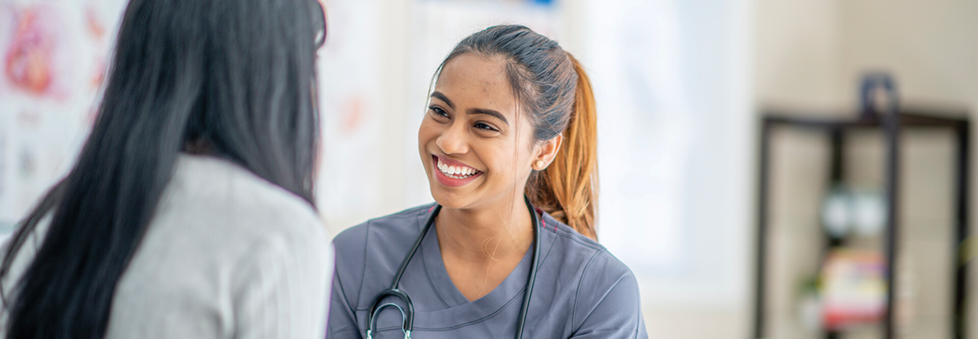 nurse smiling at patient