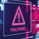 malware alert with computer code background