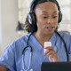 Nurse working with patient via telehealth