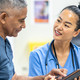 A doctor and patient talking together