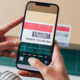person scans barcode with phone