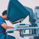 doctor performs telerobotic surgery