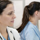 Doctors using computers in a hospital