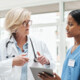 Care Team Collaborates with Data on Tables