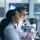 Doctors reviewing information on devices