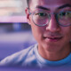 IT expert looks at monitor