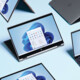 Several laptops with Windows 11 branding
