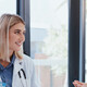 Doctors discussing data in a meeting