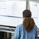 Doctors reviewing information boards