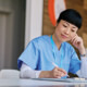 nurse studying on computer