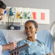 Doctor speaking with patient