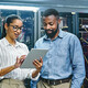 IT specialists collaborate in data center