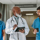 Doctor and nurses talking