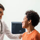 doctor reassures patient