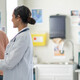 doctor and patient smiling at appointment