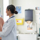 doctor and patient smiling at appointment