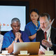 healthcare leaders meet around table