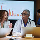 clinicians and IT team meeting