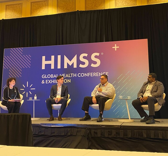 panelists on stage at HIMSS25