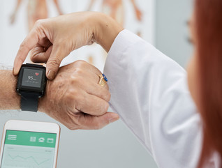Doctor syncs wearable for patient