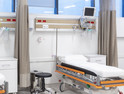 Empty hospital beds with tech