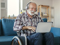 older adult with tablet computer