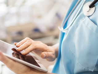 nurse with tablet