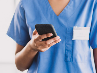 nurse on smartphone