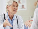 Doctor at concierge medicine clinic does a patient consult