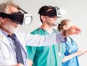 group of medical professionals train using VR headsets