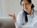 Doctor using laptop for telemedicine