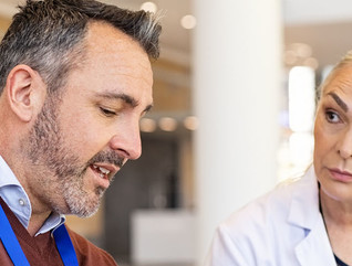 IT worker speaking with doctor