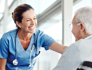 Nurse helping an elderly patient