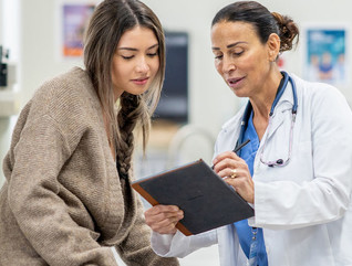 Patient speaking with doctor