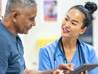 A doctor and patient talking together