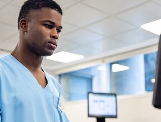Healthcare worker using the computer