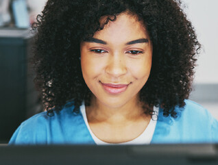 Doctor using computer