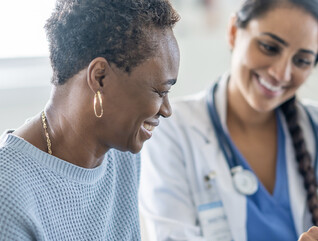 Doctor speaking with patient