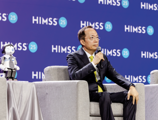panelists on stage at HIMSS25