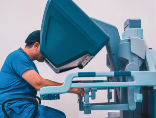 doctor performs telerobotic surgery