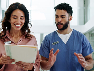 Hospital chief, teamwork and planning with doctor