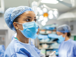 nurse check monitor in the OR