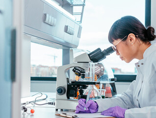 Person conducting research in lab