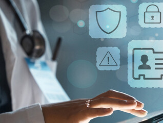 Doctor using secure tablet